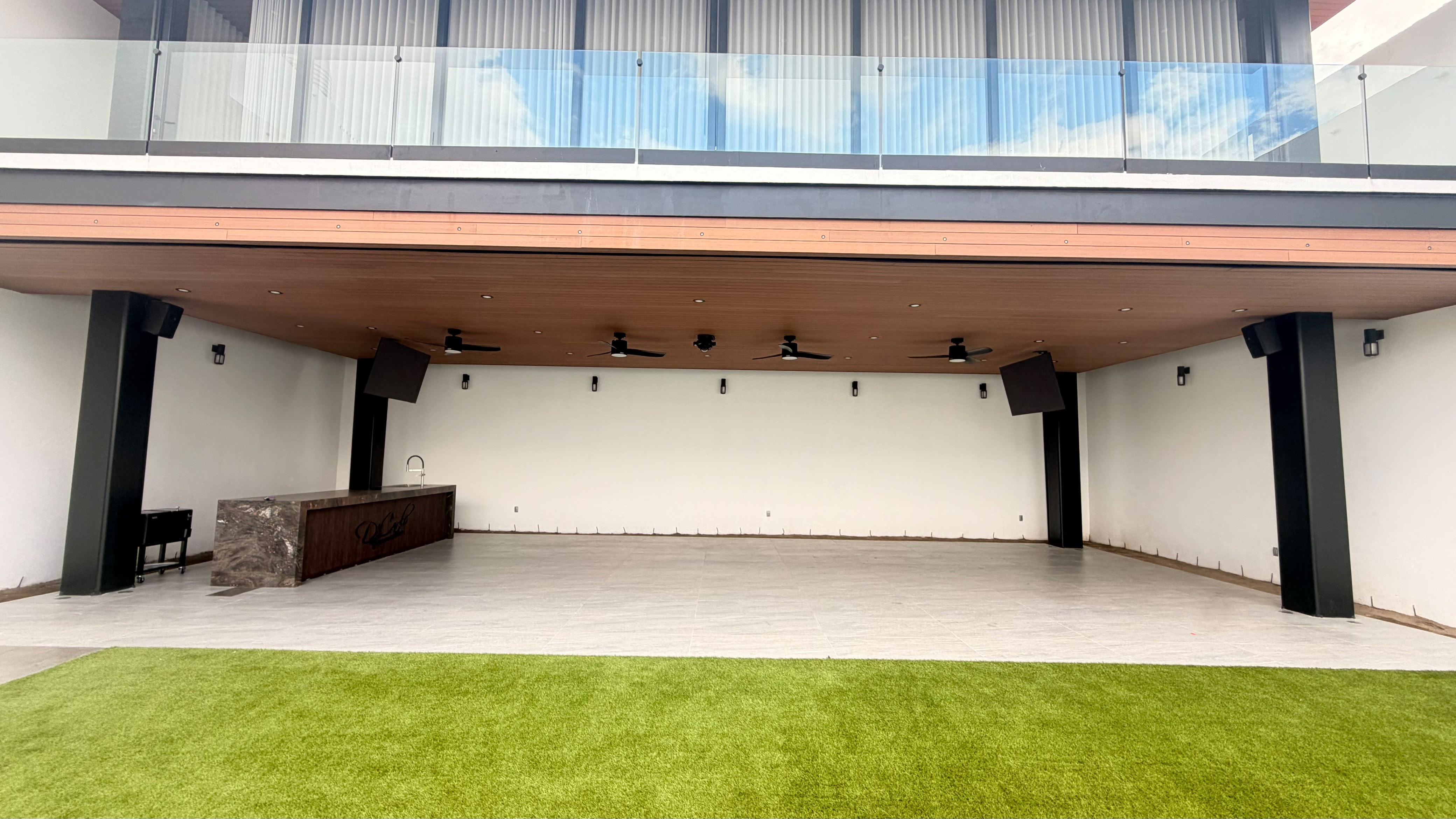 Espacio interior y jardín de D’ Carlo Terraza